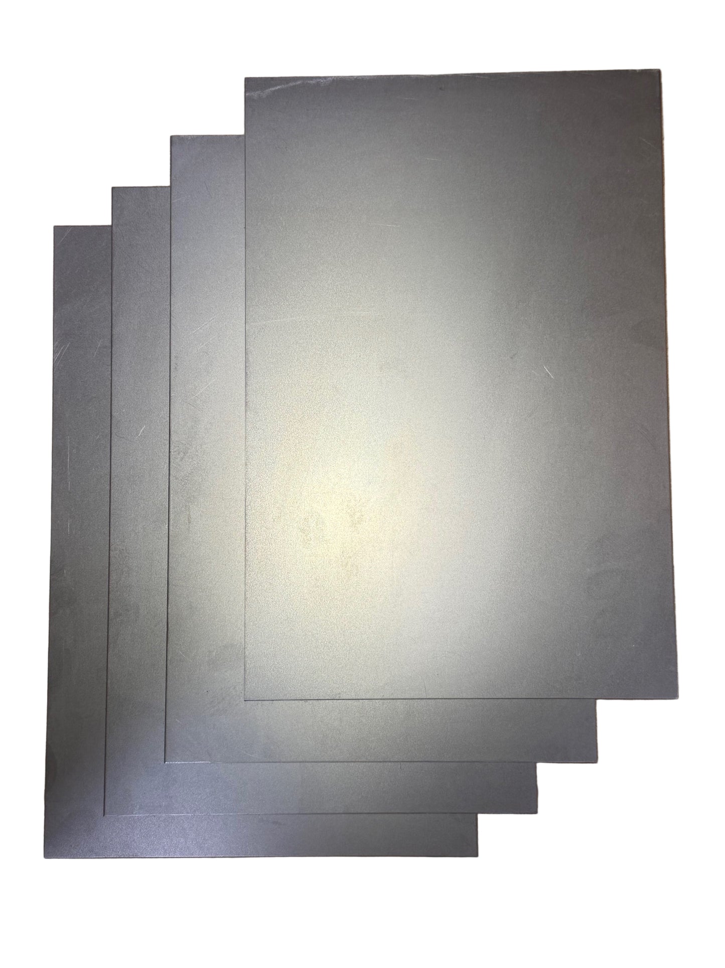 8x12 Inch Pre-Cut Cold Rolled Sheet Metal – 18 Gauge four sheets on white background in diagonal pattern
