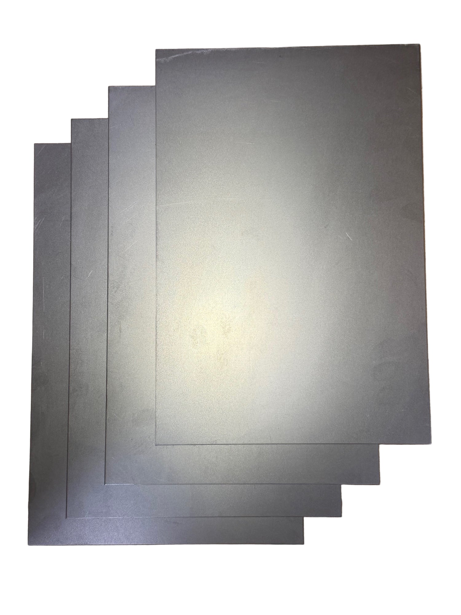 8x12 Inch Pre-Cut Cold Rolled Sheet Metal – 18 Gauge four sheets on white background in diagonal pattern