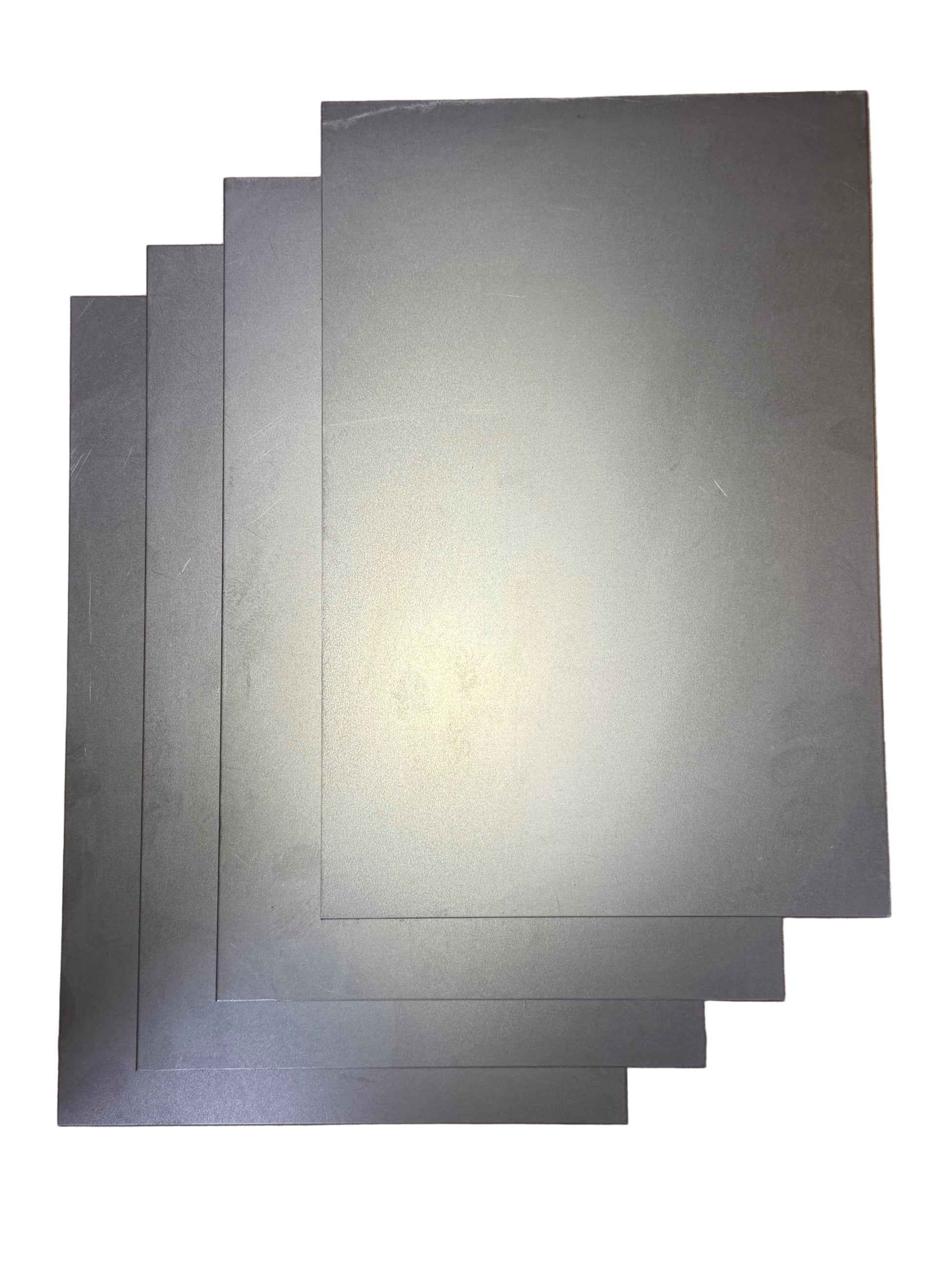 8x12 Inch Pre-Cut Cold Rolled Sheet Metal – 18 Gauge four sheets on white background in diagonal pattern